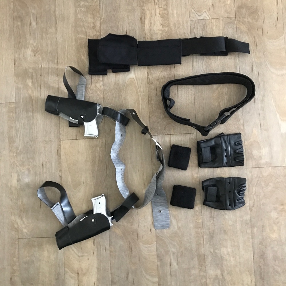 Female superhero assassin guns belts gloves black widow Laura Croft